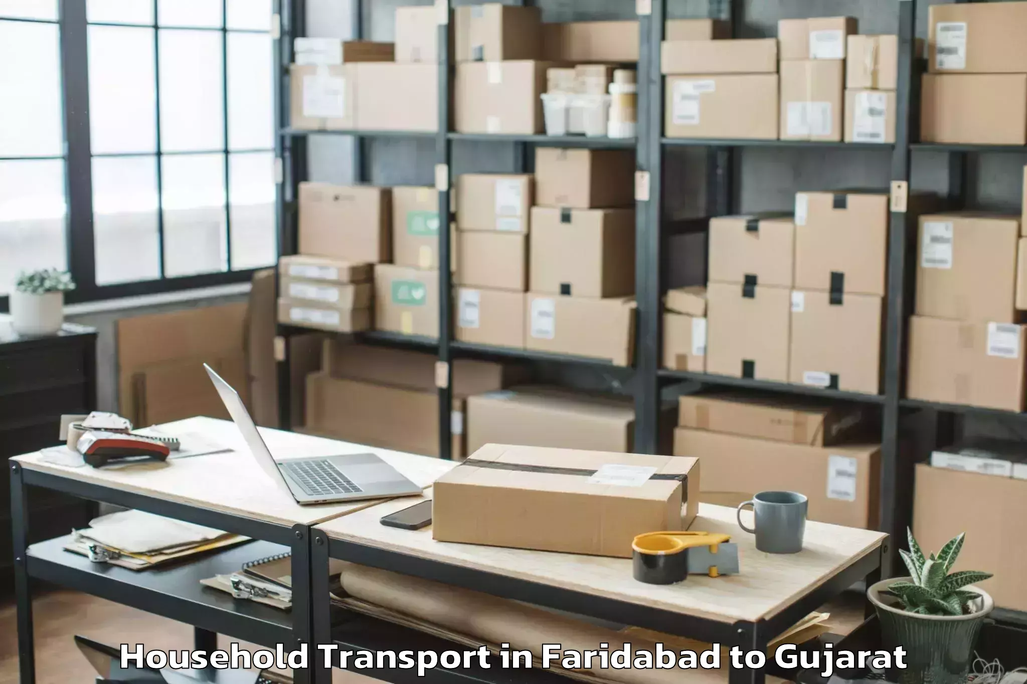 Book Faridabad to Keshod Airport Ixk Household Transport